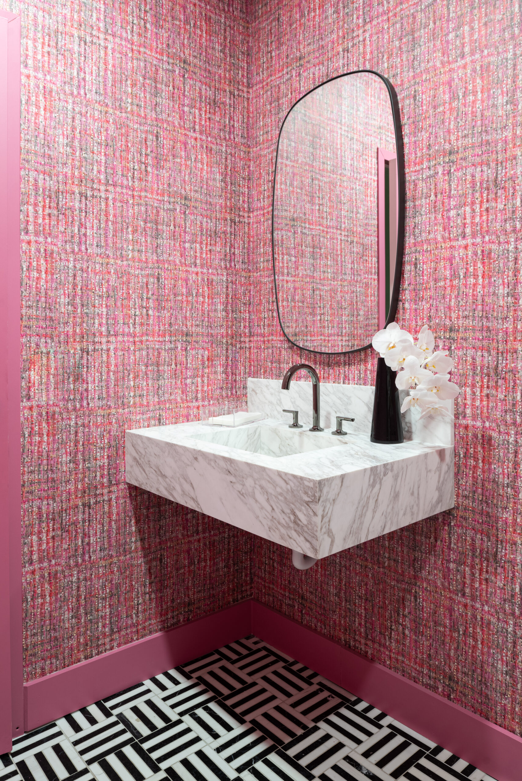 floral staging in pink bathroom